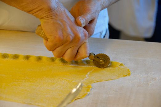 Preparation of agnolotti. Typical pasta of the Langhe, Piedmont - Italy