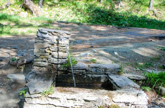 A stone fountain near Pracatinat, Piedmont - Italy