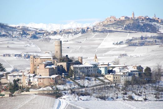 View of the Langhe hills in Piedmont with the village of Castiglion Falletto
