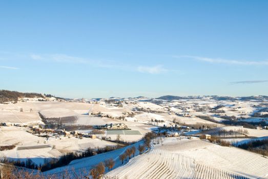 Hills of the Langhe covered by snow, Piedmont - Italy