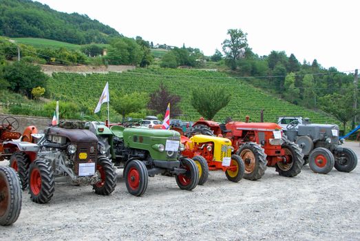 Old tractors at an exhibition in Langhe, Piedmont - Italy