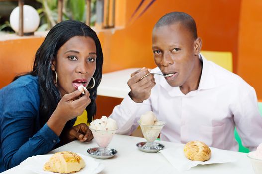 This young couple have lunch together at the restaurant.