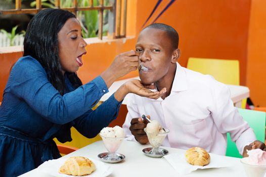 young couple have lunch together at the restaurant.