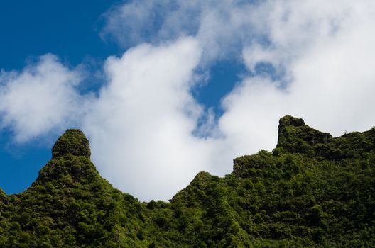 Natural mountain shapes against clouds and sky in Kalalau trail, Hawaii, Kauai