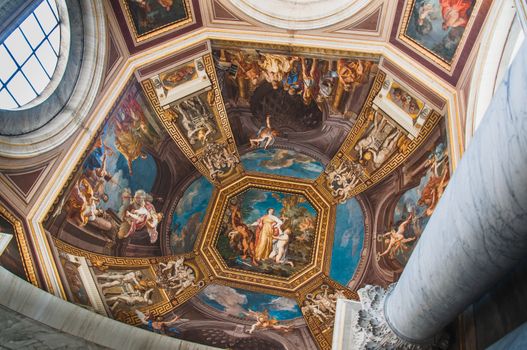 A ceiling of paintings at the Vatican Museum in Rome, Italy