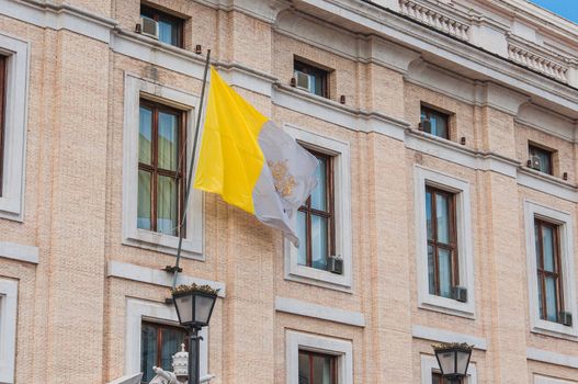 Flag on St. Peter's Square from Rome to Vatican in Italy
