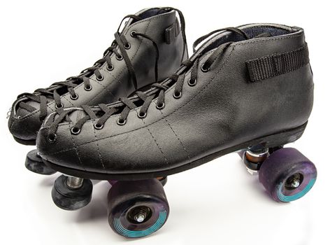 Pair of black boot roller skate with purple wheels
