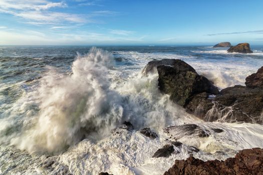 Huge crashing waves at a rocky beach. Trinidad, California.
