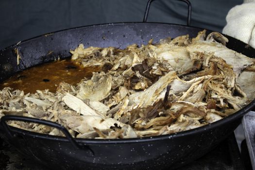 Meat stewed in a restaurant casserole, homemade food