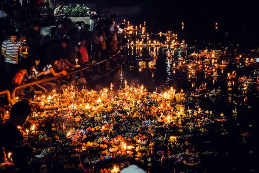 BANGKOK THAILAND - NOVEMBER 22 : Loy Krathong festival, Night shot of thai people celebrating full moon festival loy krathong on November 22, 2018 in Bangkok, Thailand
