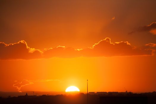 Beautiful Sydney sunsets, even in winter, views west to the setting sun as it dips on the horizon.  Plenty of space for copy