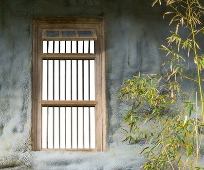 old retro prison window framework with bars isolated on white