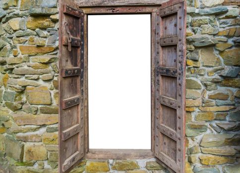 old medieval style wooden window frame in a brick wall, open and isolated on white