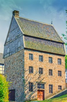 Natural stone cottage built with antique bricks