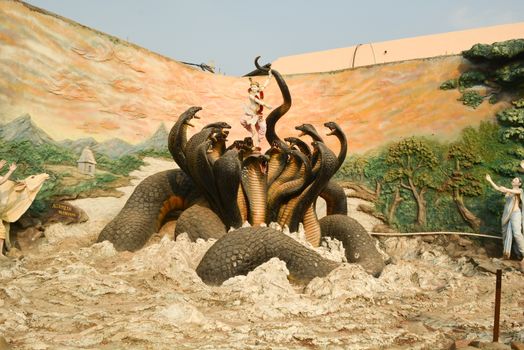 Mantralayam,Andhra Pradesh,India DECEMBER 13,2018 :sculpture of Lord Krishna dancing on the snake in mantralayam.