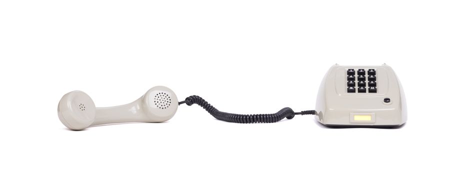 Vintage grey telephone with a white background