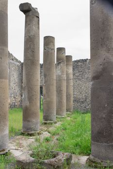 Old ancient ruined Italian Roman Pompei, walls, vertical columns