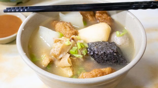 The close up of Taiwan tempura soup (Taiwanese food style) in Taipei, Taiwan.