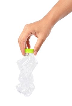 Plastic bottles recycling of a hand squeezed isolated on white background, Save clipping path.