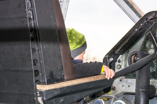 Fun in the cockpit of an old propeller aircraft