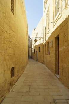 Empty narrow alley in Mdina, Malta