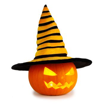 Jack O Lantern Halloween pumpkin with witches hat isolated on white background