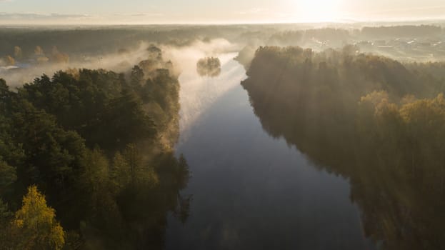 Morning smoke on the water Ulbroka lake Aerial drone top view Latvia