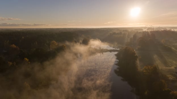 Morning smoke on the water Ulbroka lake Aerial drone top view Latvia