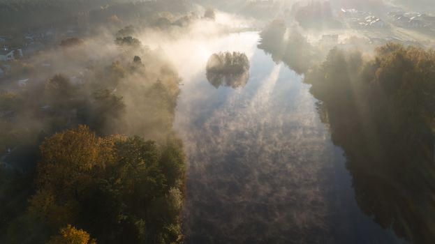 Morning smoke on the water Ulbroka lake Aerial drone top view Latvia