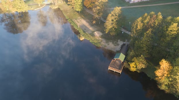 Morning smoke on the water Ulbroka lake Aerial drone top view Latvia