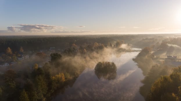 Morning smoke on the water Ulbroka lake Aerial drone top view Latvia