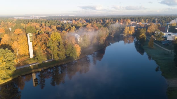 Morning smoke on the water Ulbroka lake Aerial drone top view Latvia