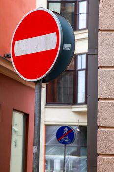 Road sign No Entry before entering the Old Riga, Latvia. No Entry sign in center of Riga.