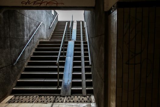 Pedestrian tunnel stairs in Riga, Latvia. Stairs leading out of concrete pedestrian tunnel to the city. 
