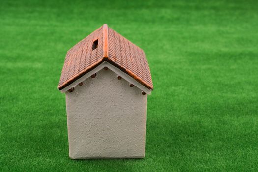 Model house on fake grass