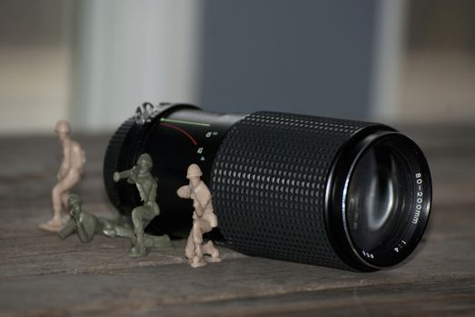 This image shows toy soldiers guarding a lens. 
