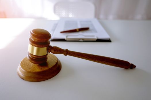 Judge gavel hammer on Lawyer desk