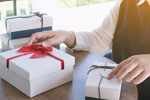 Valentine present. Gift box and red ribbon for romantic couple