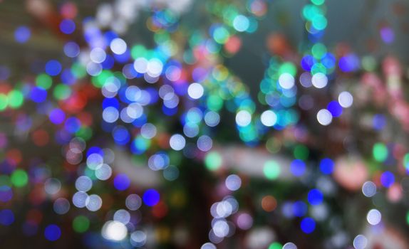 Abstract bokeh glitter vintage lights. Christmas bokeh light defocused abstract background.Can be used wallpaper texture with copy space area for a text.