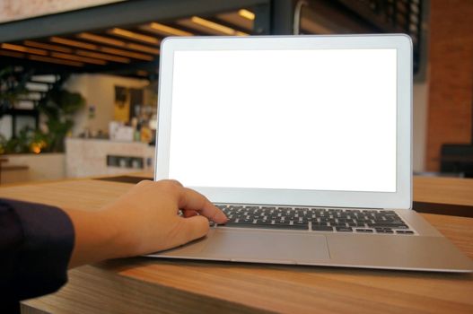 Business woman working on Laptop with Mock up blank screen. technology concept.