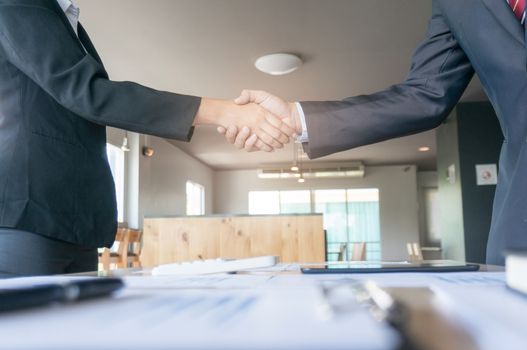 Image business mans handshake. Business partnership meeting concept.