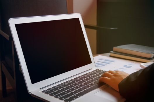 Business woman working on Laptop with Mock up blank screen. technology concept.