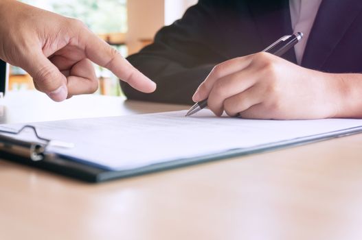 Man Completing Application Form during job interview. human resources concept