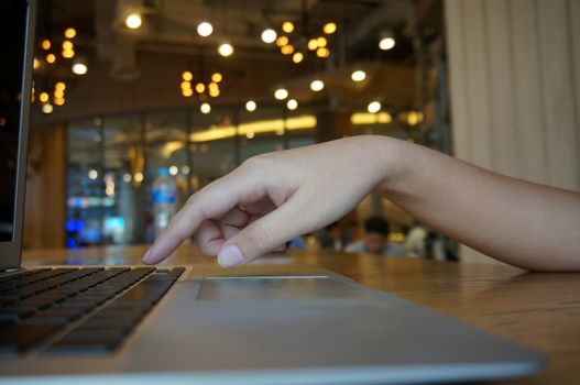 The Casual business woman works Hand typing on laptop keyboard