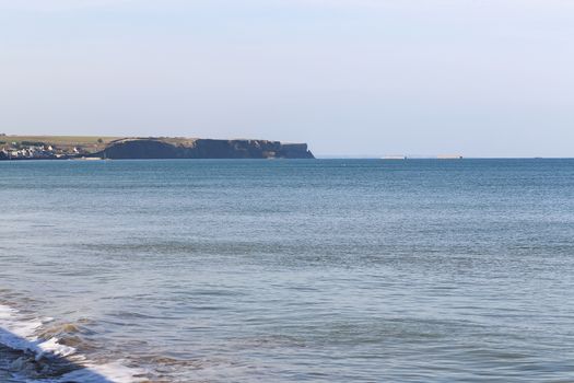 Ruins of harbor built by the Allies in Arromanches, Normandy, France