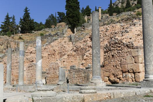 The ruins in Delphi, an archaeological site in Greece at the Mount Parnassus. Delphi is famous by the oracle at the sanctuary dedicated to Apollo. UNESCO World heritage