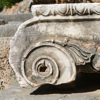 The ruins in Delphi, an archaeological site in Greece at the Mount Parnassus. Delphi is famous by the oracle at the sanctuary dedicated to Apollo. UNESCO World heritage