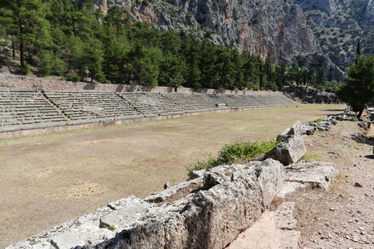 The ruins in Delphi, an archaeological site in Greece at the Mount Parnassus. Delphi is famous by the oracle at the sanctuary dedicated to Apollo. UNESCO World heritage