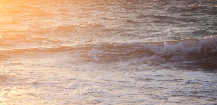 beautiful sea waves at sunset -  beach holiday background