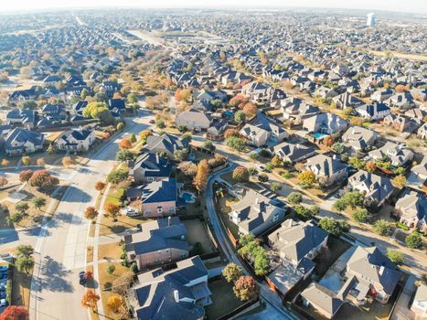 Aerial view new development neighborhood in Cedar Hill, Texas, USA in morning fall with colorful leaves. A city in Dallas and Ellis counties located approximately 16 miles southwest of downtown Dallas